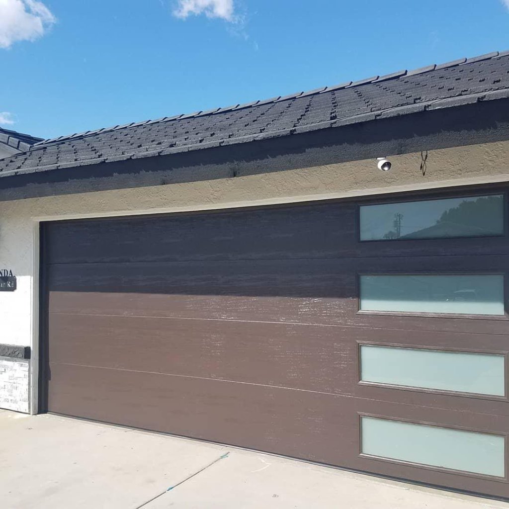 Cream raised panel garage door installed at North Hollywood home by MSB Garage Door Repair