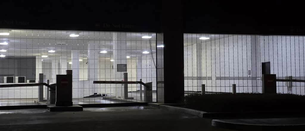 Contemporary garage door with frosted glass inserts installed at Studio City modern home
